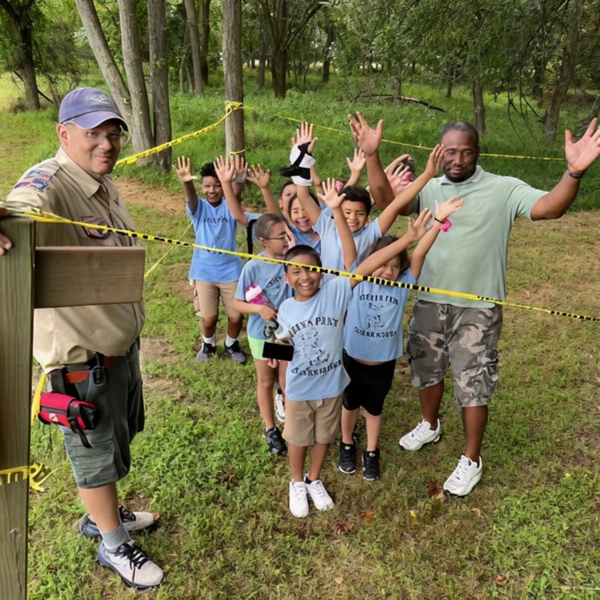 Scouts working together on a hands-on group project during a Scouting activity.