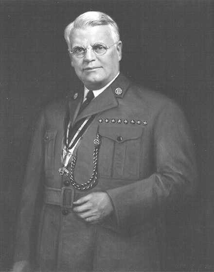 Black-and-white portrait of James E. West wearing a Boy Scouts of America uniform.
