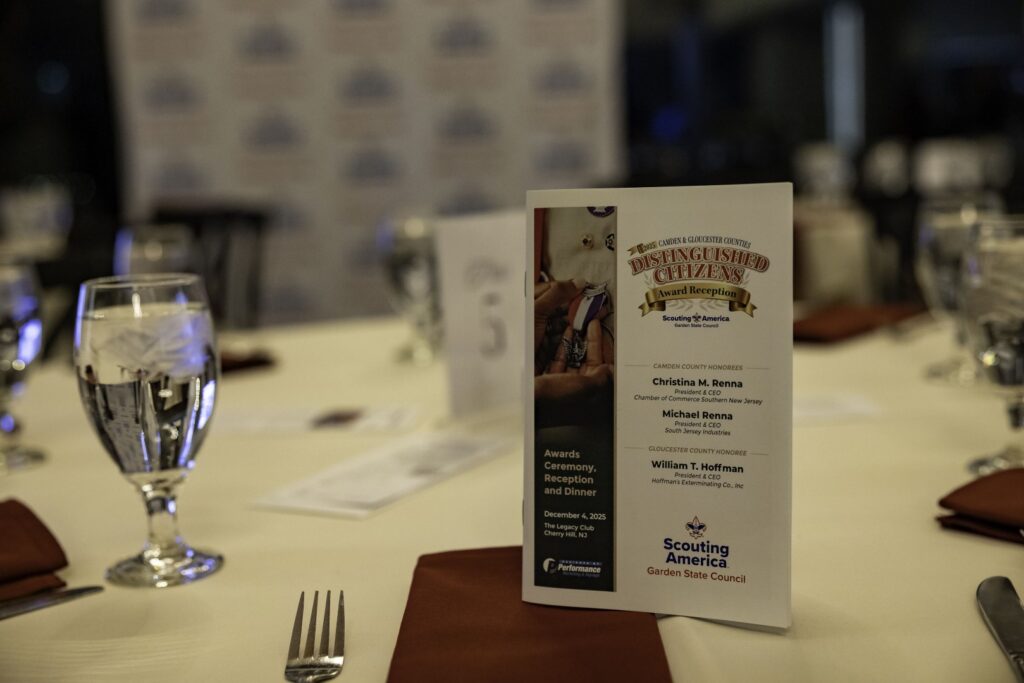 Distinguished Citizens Award Reception program displayed on a table at a Garden State Council event.