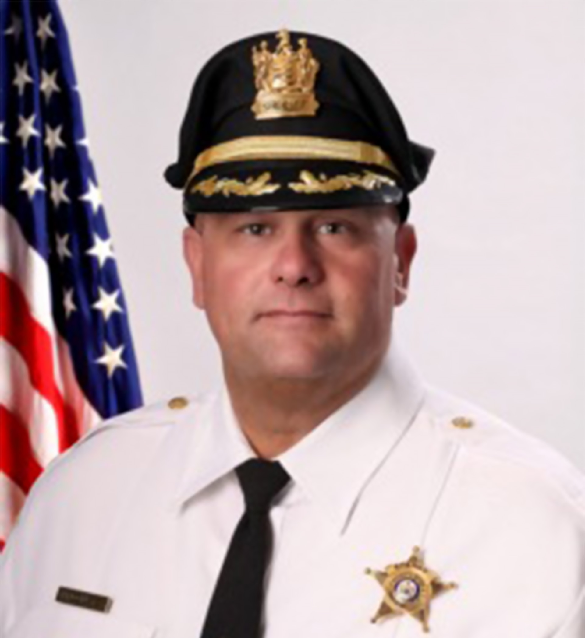Sheriff Michael Donato smiling in uniform for a professional headshot.